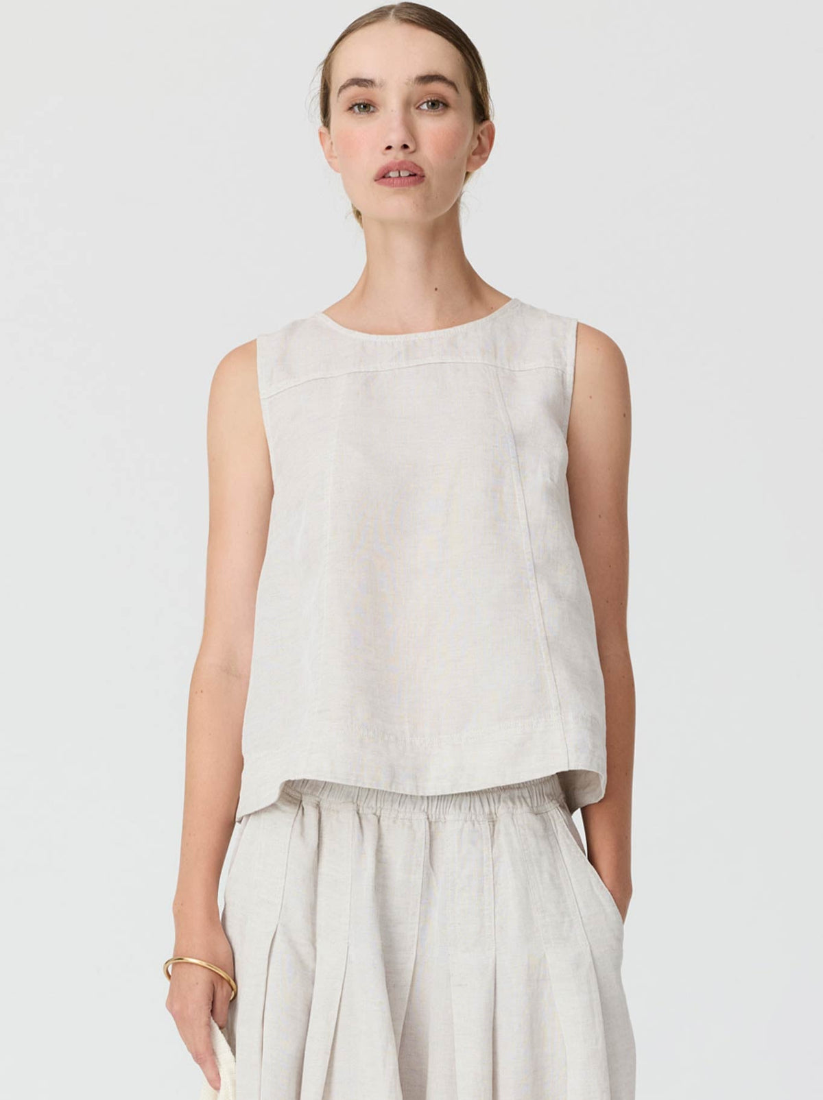 Image of a model wearing Tops. Product name - Pol Frankie Button Tank in Natural colour by brand - Pol