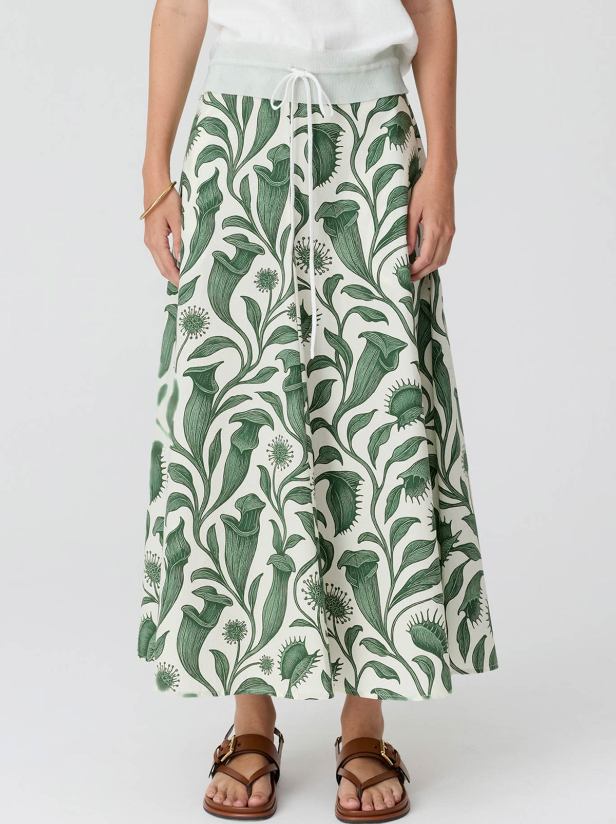 Image of a model wearing Skirts. Product name - Pol Botanica Skirt in Botanica colour by brand - Pol