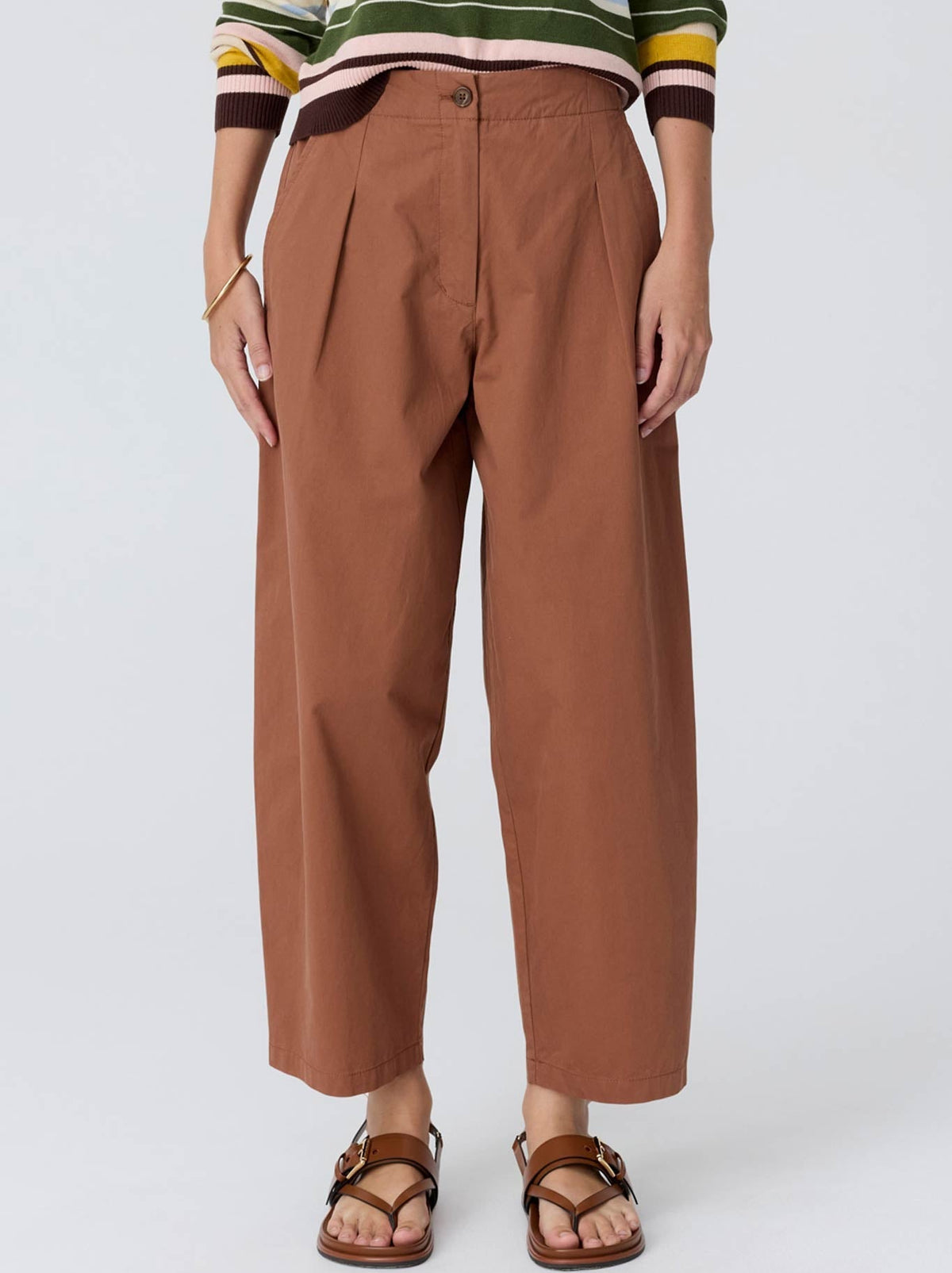 Image of a model wearing Pants. Product name - POL ALMA BARREL PANT in Toffee colour by brand - Pol