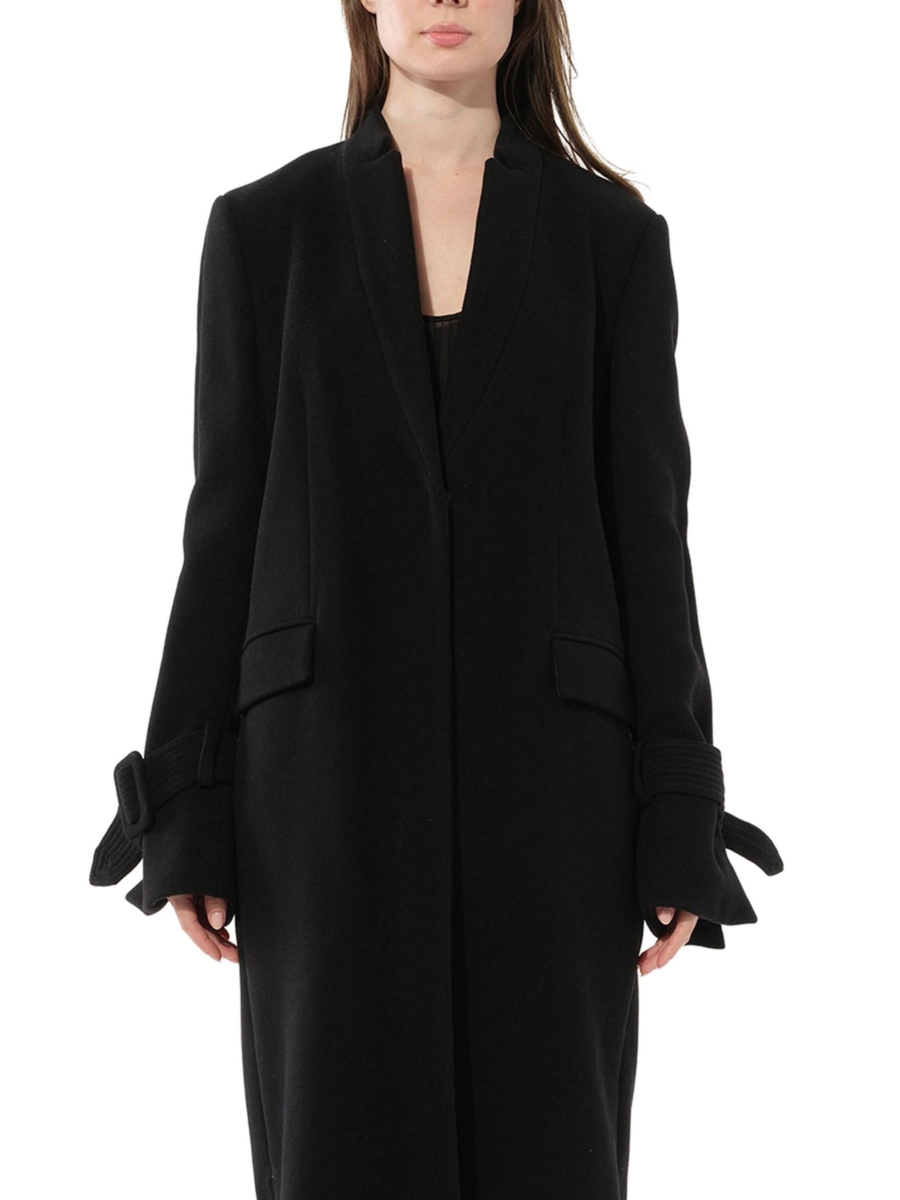 Image of a model wearing Outerwear. Productname: PUCCI Long Coat in Black colour by brand - PUCCI