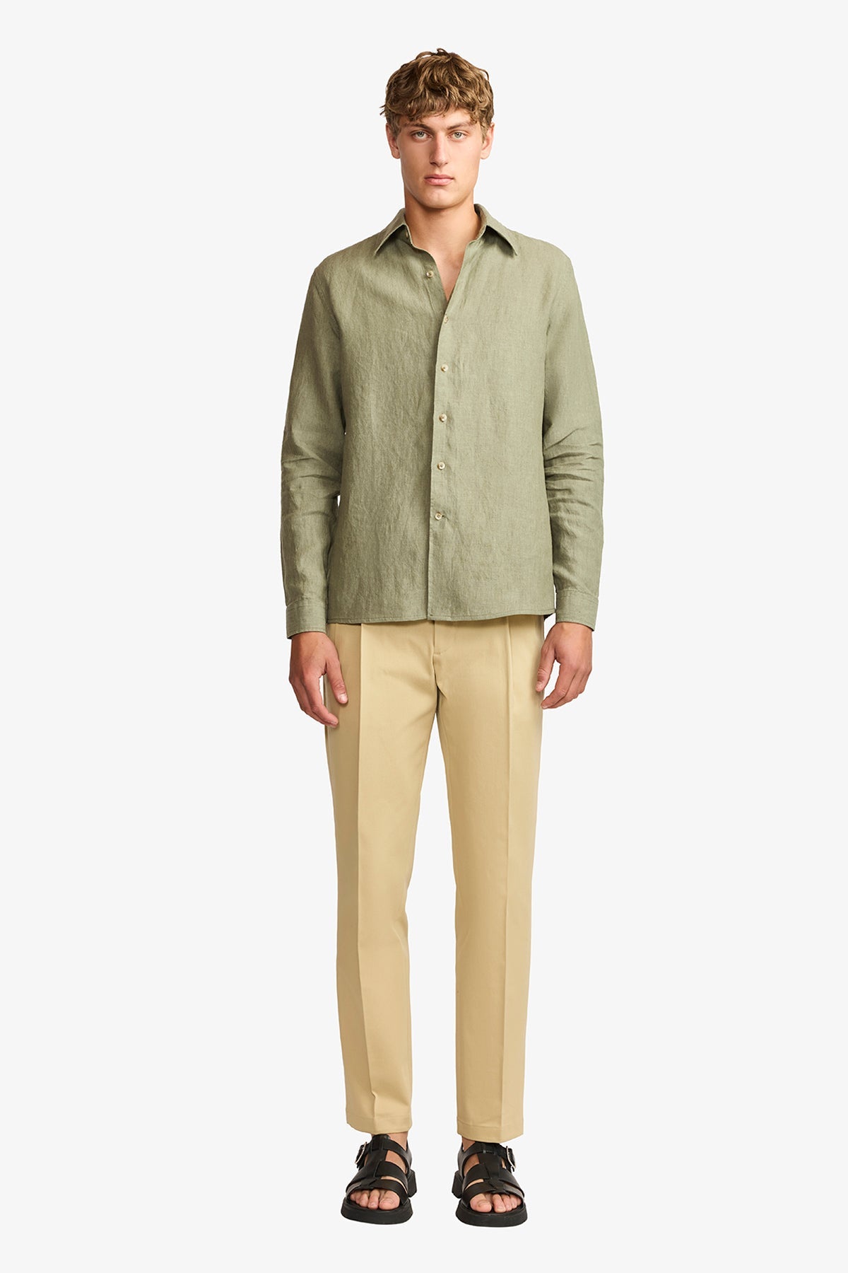 Image of a model wearing Tops. Productname: Anthony Squires Quy olive linen shirt in Olive colour by brand - Anthony Squires