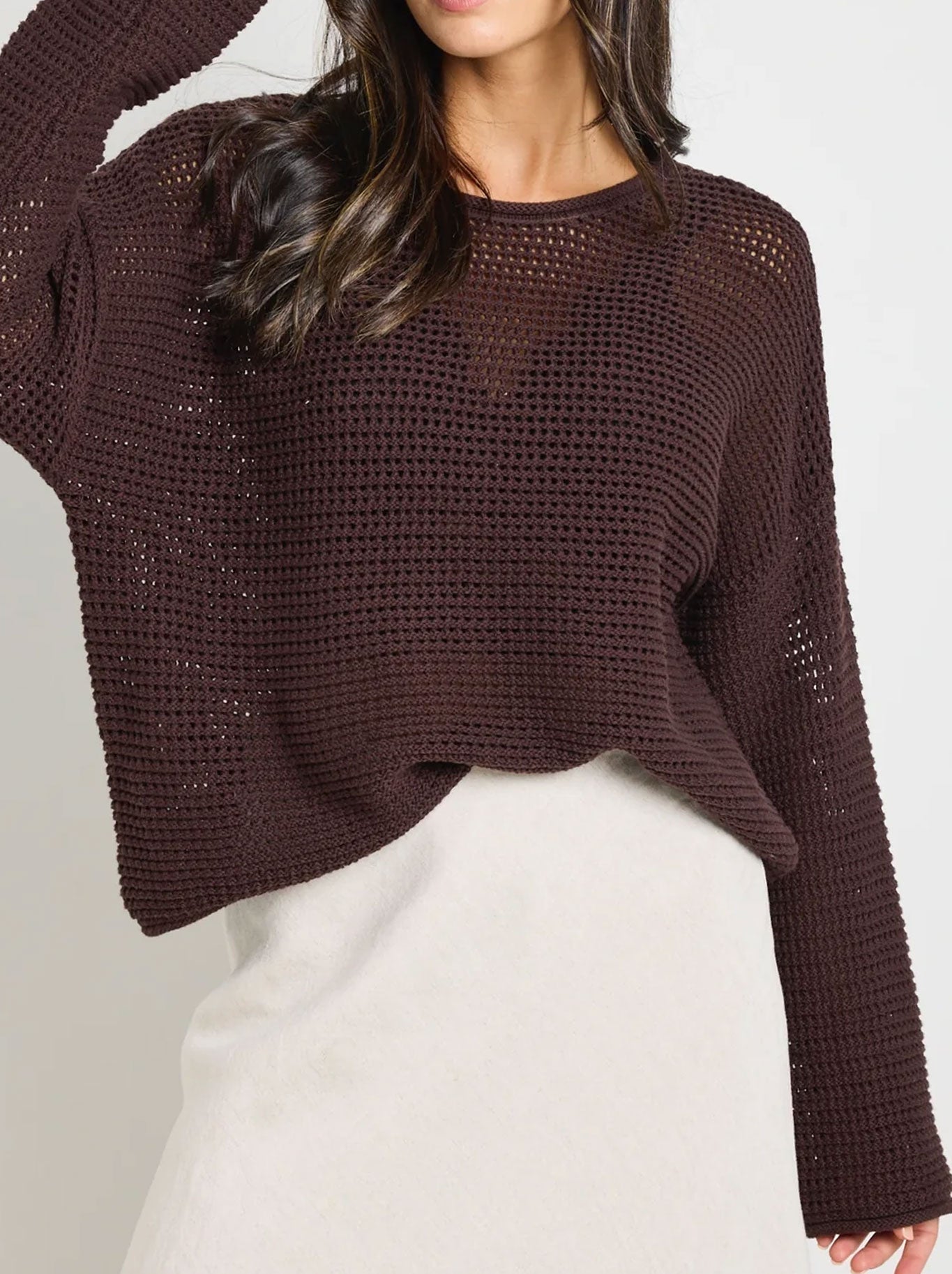 Image of a model wearing Outerwear. Productname: RE:UNION THE LABEL DAWN CROCHET JUMPER in Chocolate colour by brand - Re:Union The Label