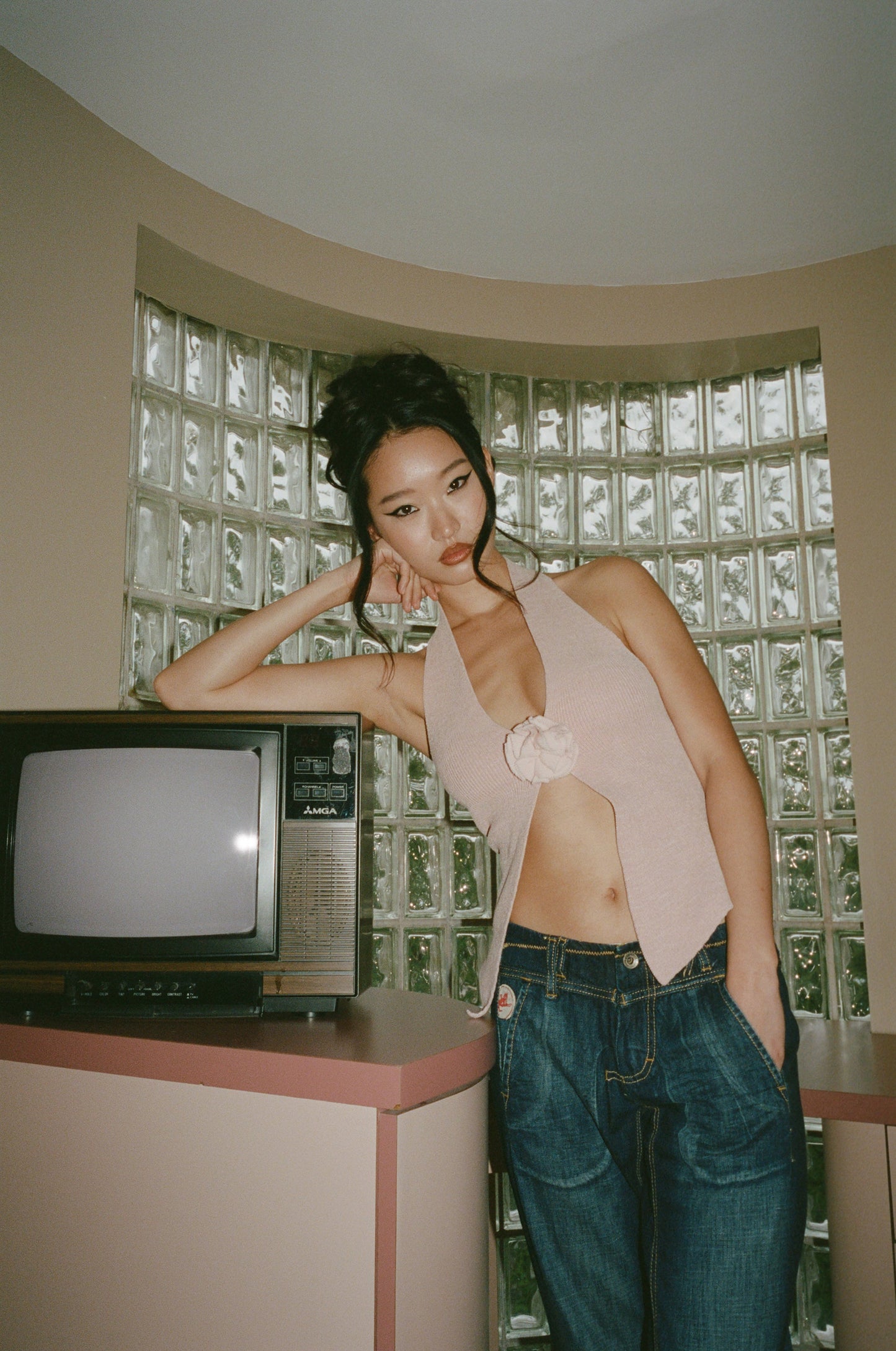 Image of a model wearing Tops. Product name - Rose Top in Pink colour by brand - With Jéan
