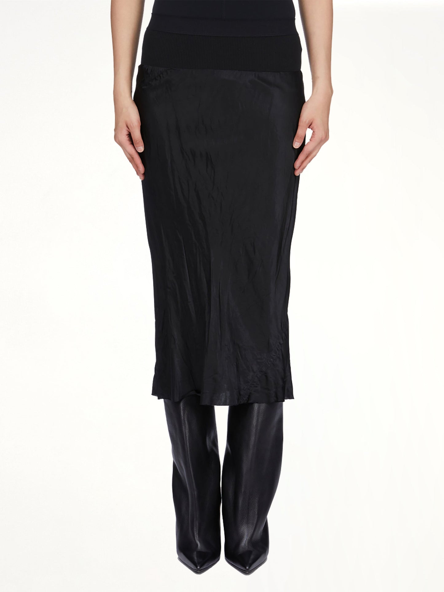 Image of a model wearing Skirts. Product name - Knee Bias Skirt in Black colour by brand - RICK OWENS