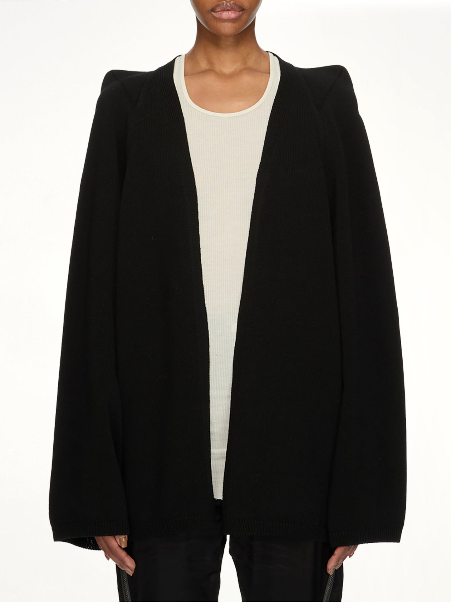 Image of a model wearing Tops. Product name - Con V Top in Black colour by brand - RICK OWENS