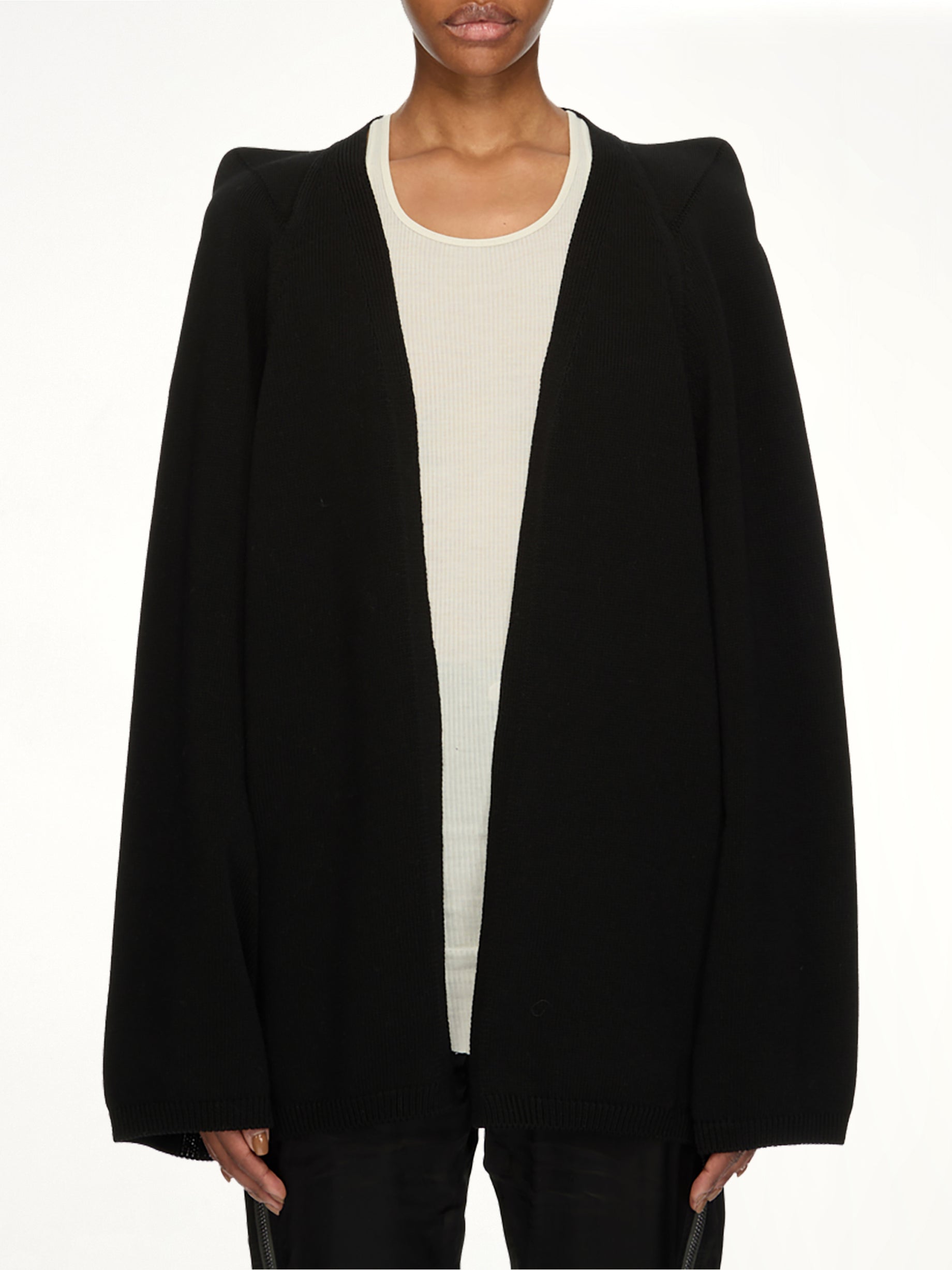 Image of a model wearing Tops. Product name - Con V Top in Black colour by brand - RICK OWENS