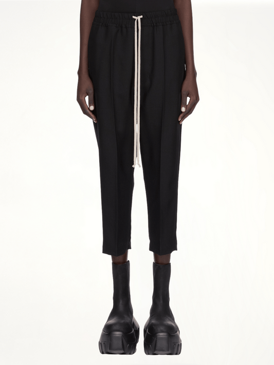 Image of a model wearing Pants. Productname: RICK OWENS Drawstring Astaires Cropped in Black colour by brand - RICK OWENS