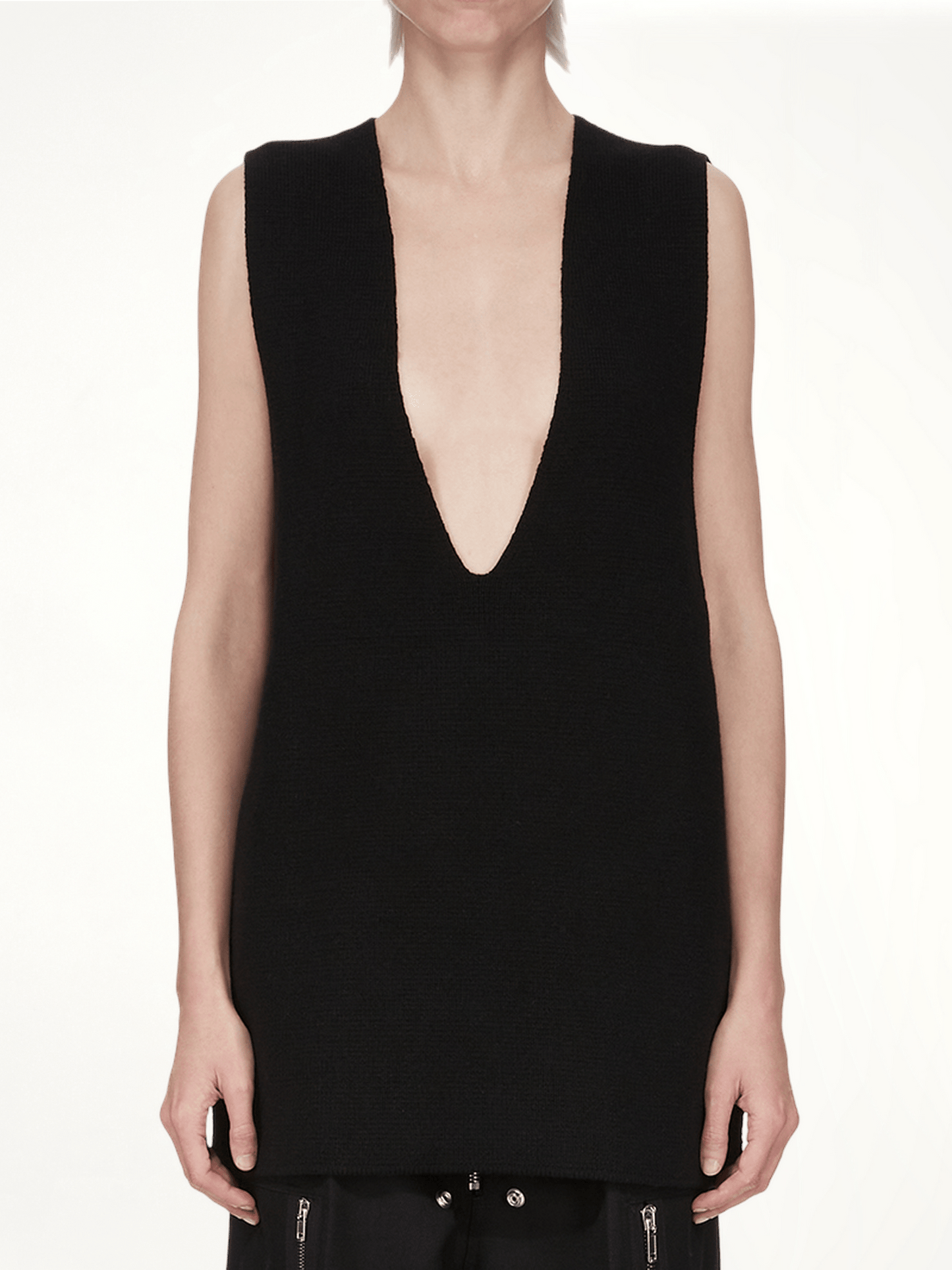 Image of a model wearing Outerwear. Productname: RICK OWENS V Tank Sweater in Black colour by brand - RICK OWENS