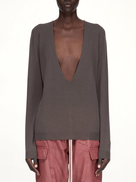 Image of a model wearing Outerwear. Productname: RICK OWENS Extreme V Neck Pull in Dark Dust colour by brand - RICK OWENS