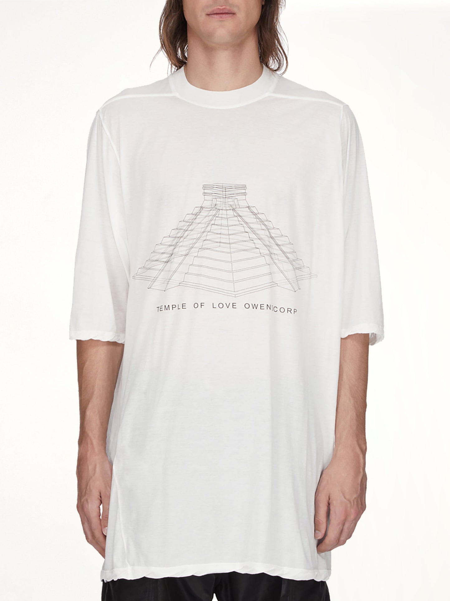 Image of a model wearing Tops. Product name - Jumbo SS T in White colour by brand - RICK OWENS