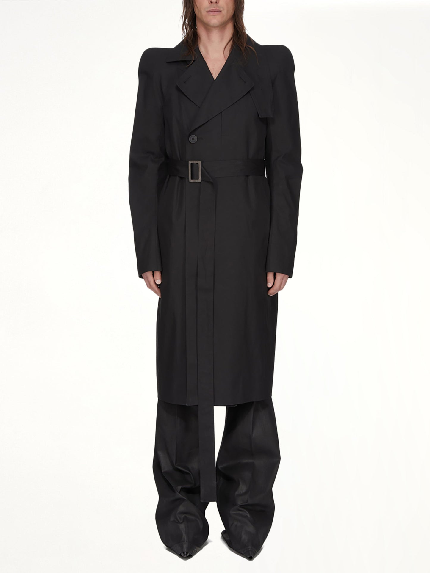 Image of a model wearing Outerwear. Product name - Temple Trench in Black colour by brand - RICK OWENS