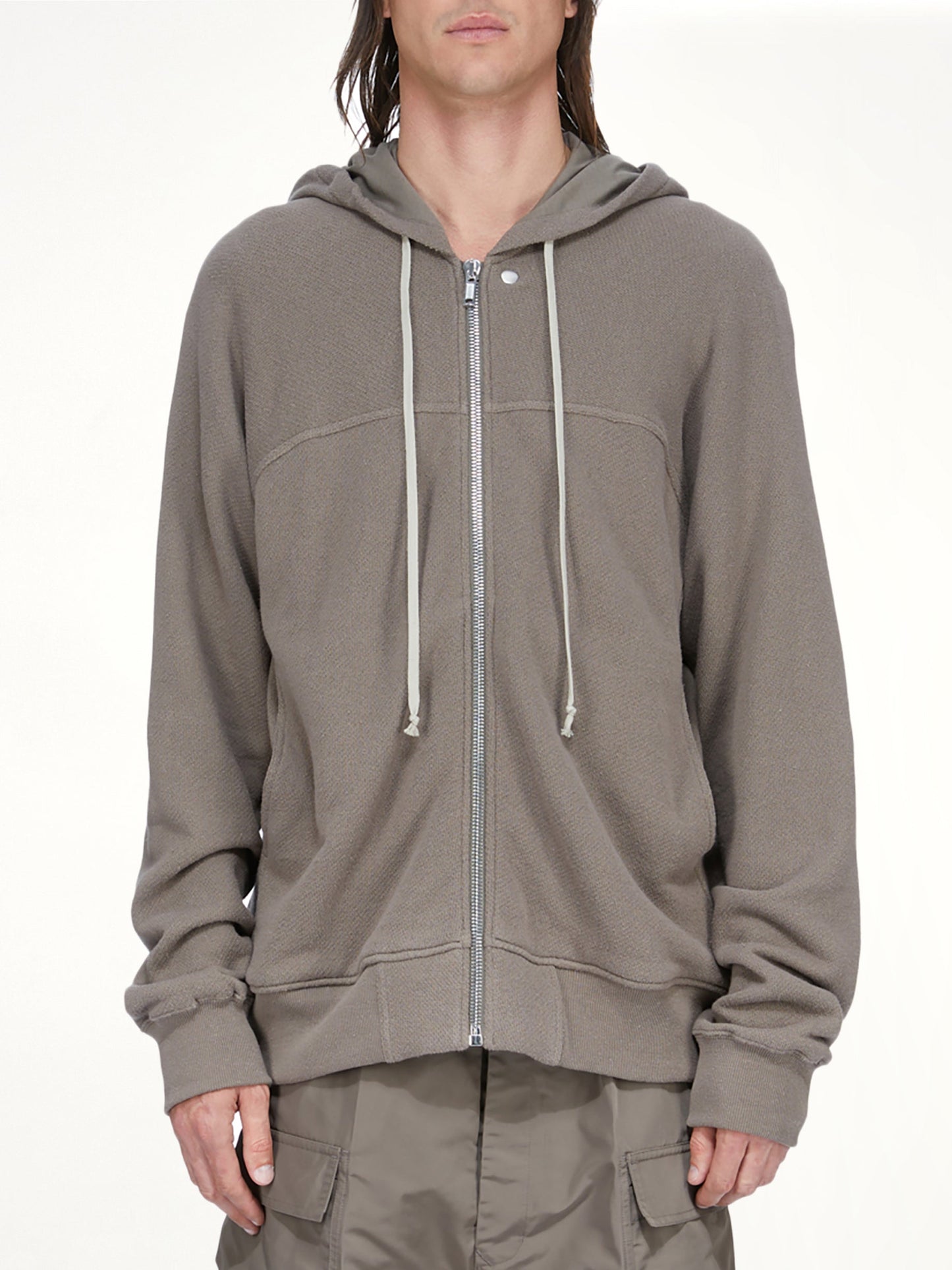Image of a model wearing Outerwear. Product name - Windbreaker in Brown colour by brand - RICK OWENS