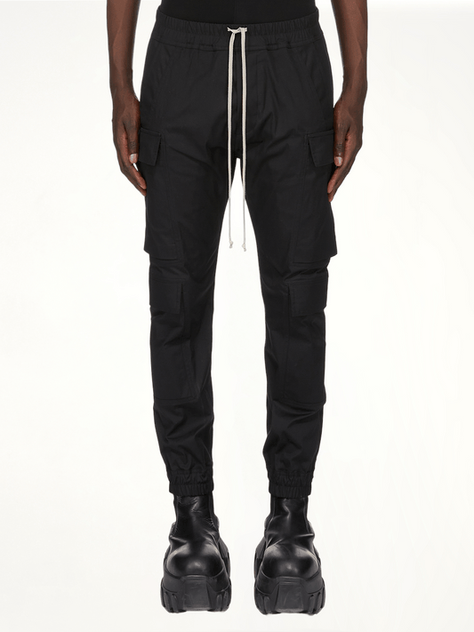 Image of a model wearing Pants. Productname: RICK OWENS Mastodon Megacargo in Black colour by brand - RICK OWENS