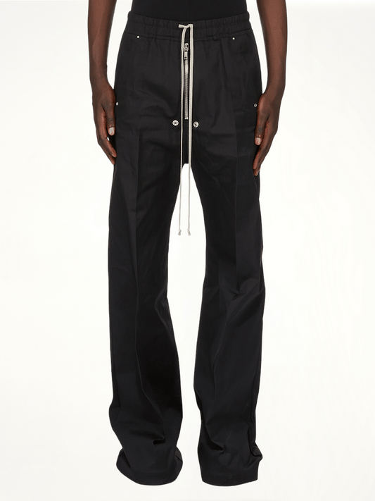 Image of a model wearing Pants. Productname: RICK OWENS Wide Bela Pants in Black colour by brand - RICK OWENS