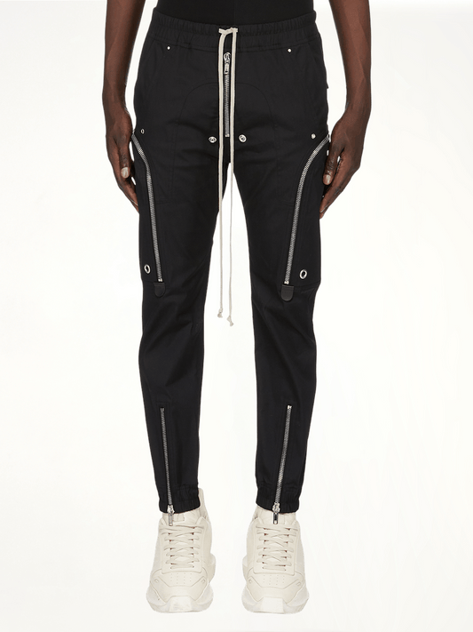 Image of a model wearing Pants. Productname: RICK OWENS Bauhaus Cargo Pants in Black colour by brand - RICK OWENS
