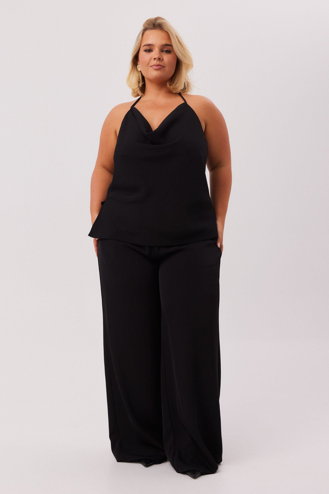 Image of a model wearing Pants. Productname: SNDYS RUE PANTS in Black colour by brand - SNDYS