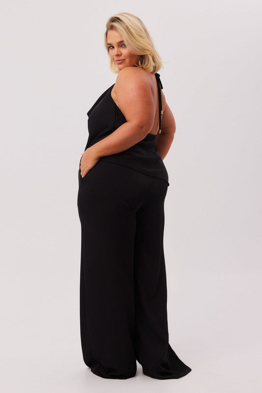 Image of a model wearing Tops. Productname: SNDYS RUE COWL TOP in Black colour by brand - SNDYS