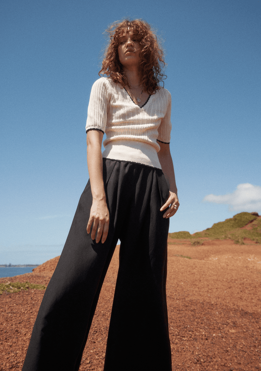 Image of a model wearing Pants. Productname: Auguste The Label Rune Pant in Black colour by brand - Auguste The Label