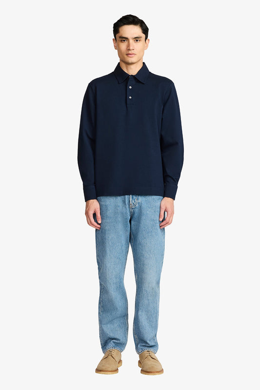 Image of a model wearing Tops. Productname: Anthony Squires Raffa Navy Blue Knitted Polo in Blue colour by brand - Anthony Squires