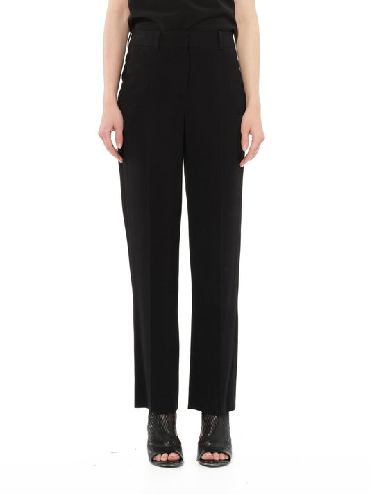 Image of a model wearing Pants. Productname: GIVENCHY Regular Fit Pants in Black colour by brand - GIVENCHY