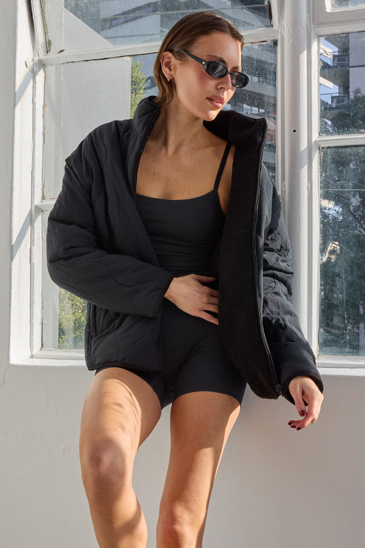 Image of Coats & Jackets. Product name - Reversible Quilted Sherpa Jacket in Black colour by brand - All Fenix