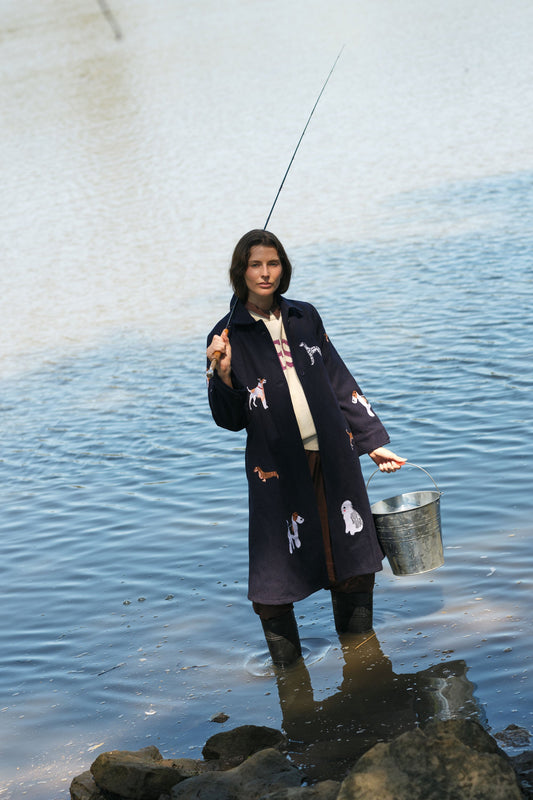 Image of a model wearing Outerwear. Product name - Rubyyaya Haute Dog Trench Navy in Navy colour by brand - Rubyyaya