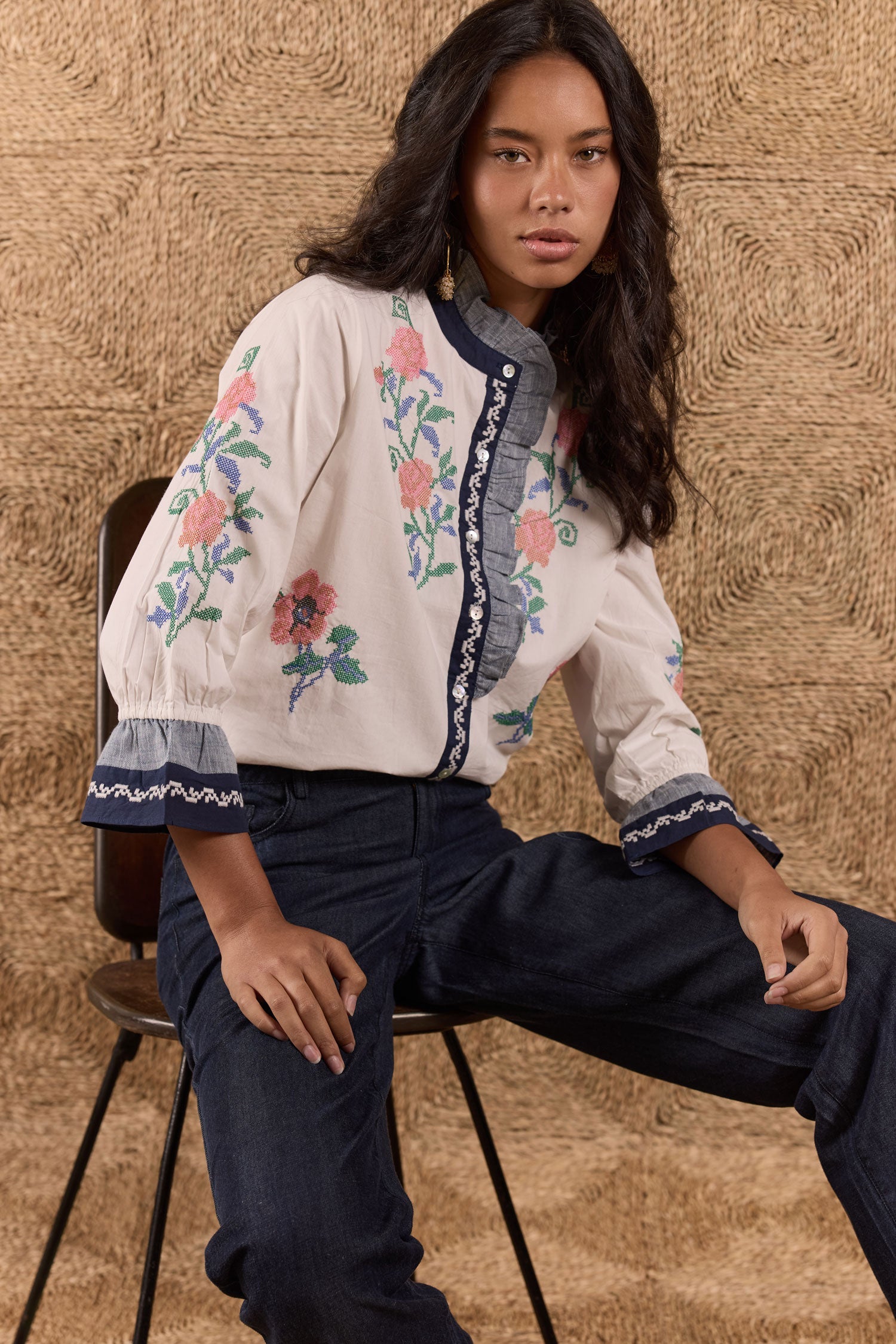 Image of a model wearing Tops. Product name - Rubyyaya Lara Frill Top Cream in Cream colour by brand - Rubyyaya
