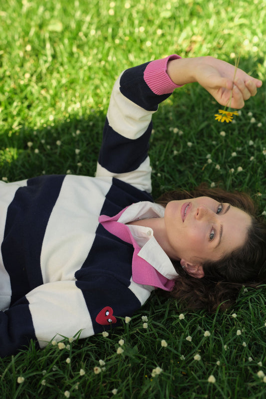 Image of a model wearing Outerwear. Product name - Rubyyaya Team Spirit Sweater Stripe in Stripe colour by brand - Rubyyaya