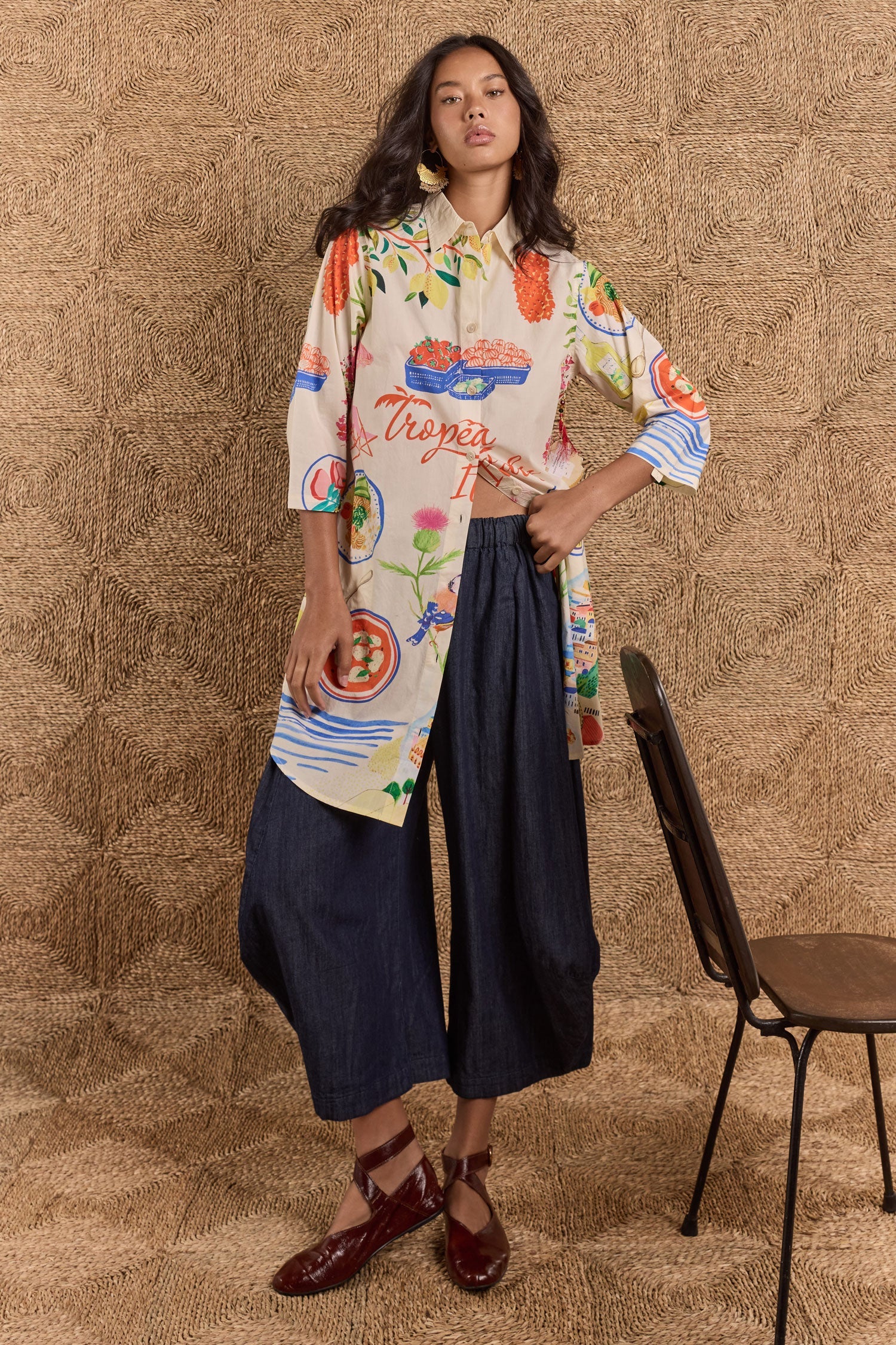 Image of a model wearing Tops. Product name - Rubyyaya Tropea Shirtmaker Print in Print colour by brand - Rubyyaya