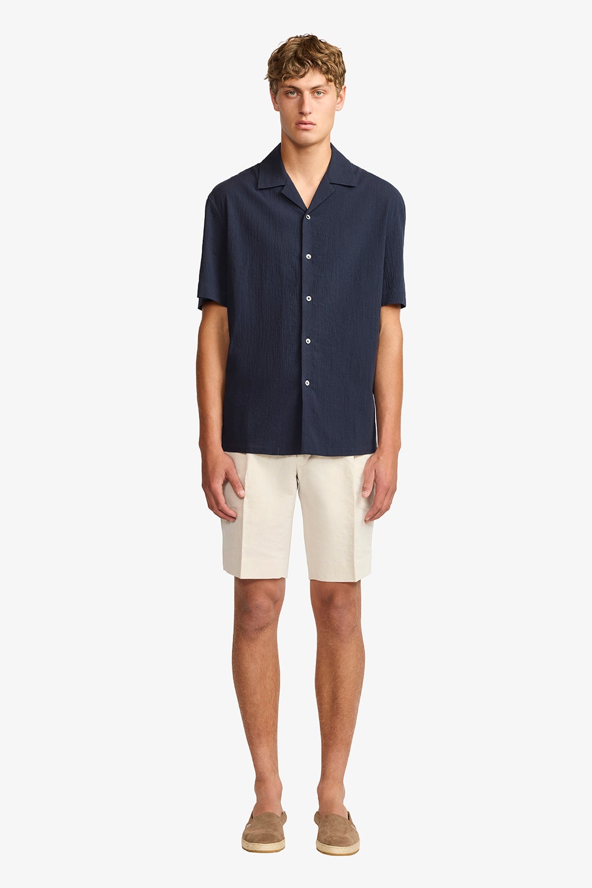 Image of a model wearing Tops. Productname: Anthony Squires Navy seersucker S/S shirt in Navy colour by brand - Anthony Squires