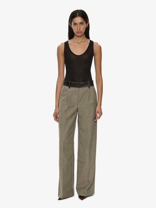 Image of a model wearing Pants. Product name - Tropical Wool Leather Waisted Trouser in Kombu colour by brand - CHRISTOPHER ESBER