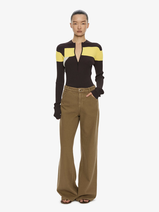 Image of a model wearing Pants. Product name - Relaxed Denim Quartz Jean in Khaki colour by brand - CHRISTOPHER ESBER