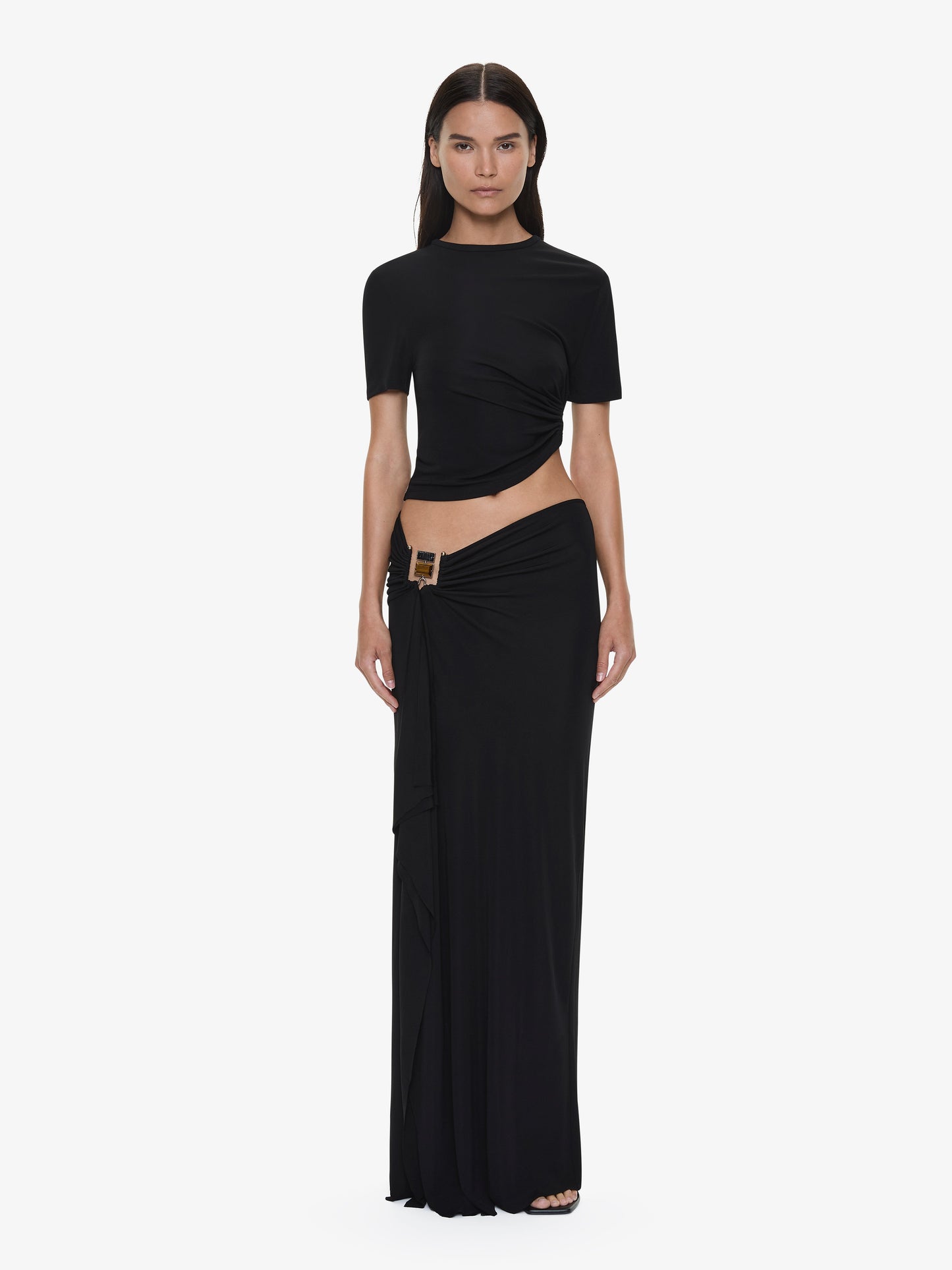 Image of a model wearing Skirts. Productname: CHRISTOPHER ESBER Bezel Quartz Cascade Skirt in Black colour by brand - CHRISTOPHER ESBER