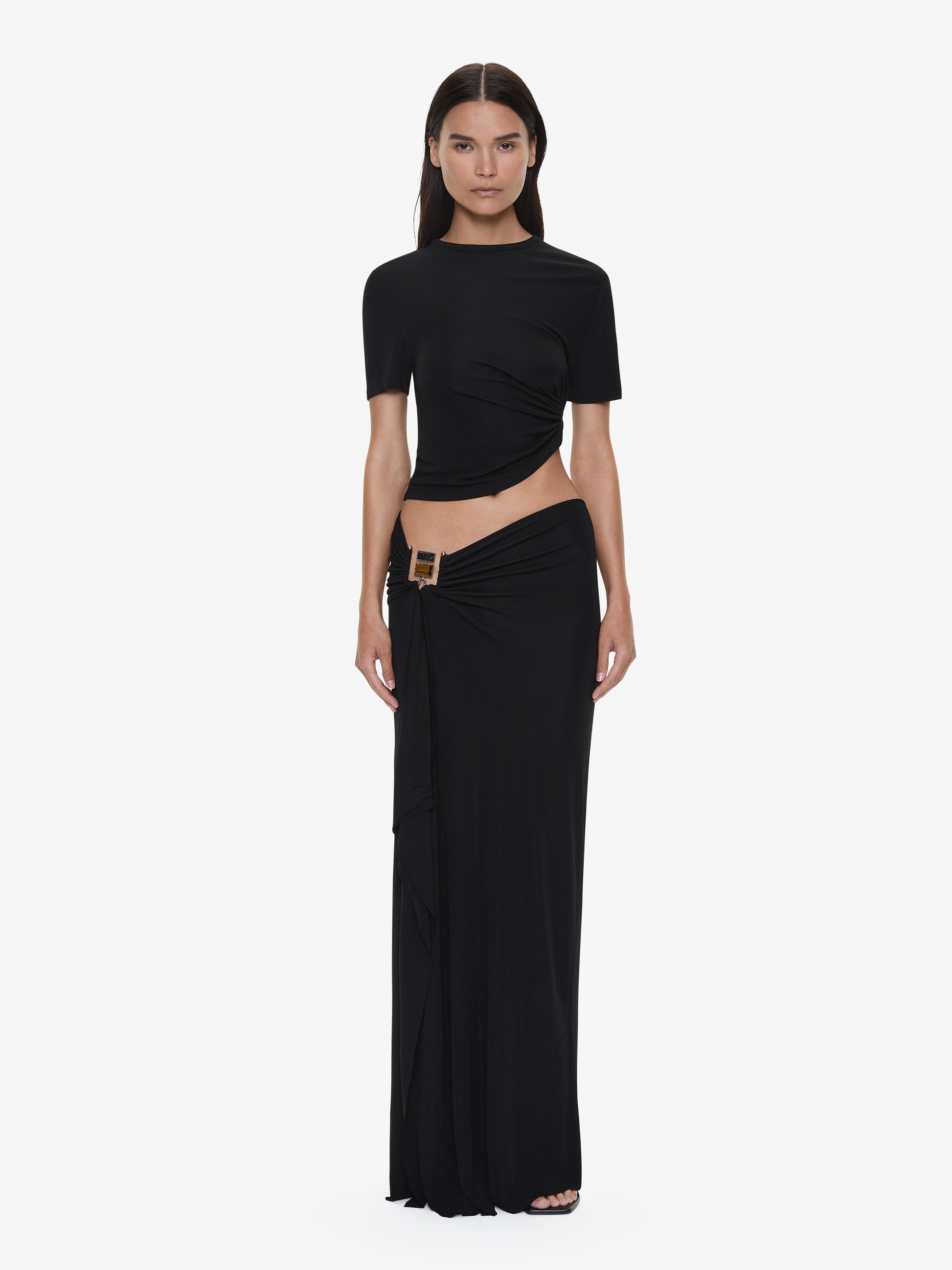 Image of a model wearing Skirts. Productname: CHRISTOPHER ESBER Bezel Quartz Cascade Skirt in Black colour by brand - CHRISTOPHER ESBER