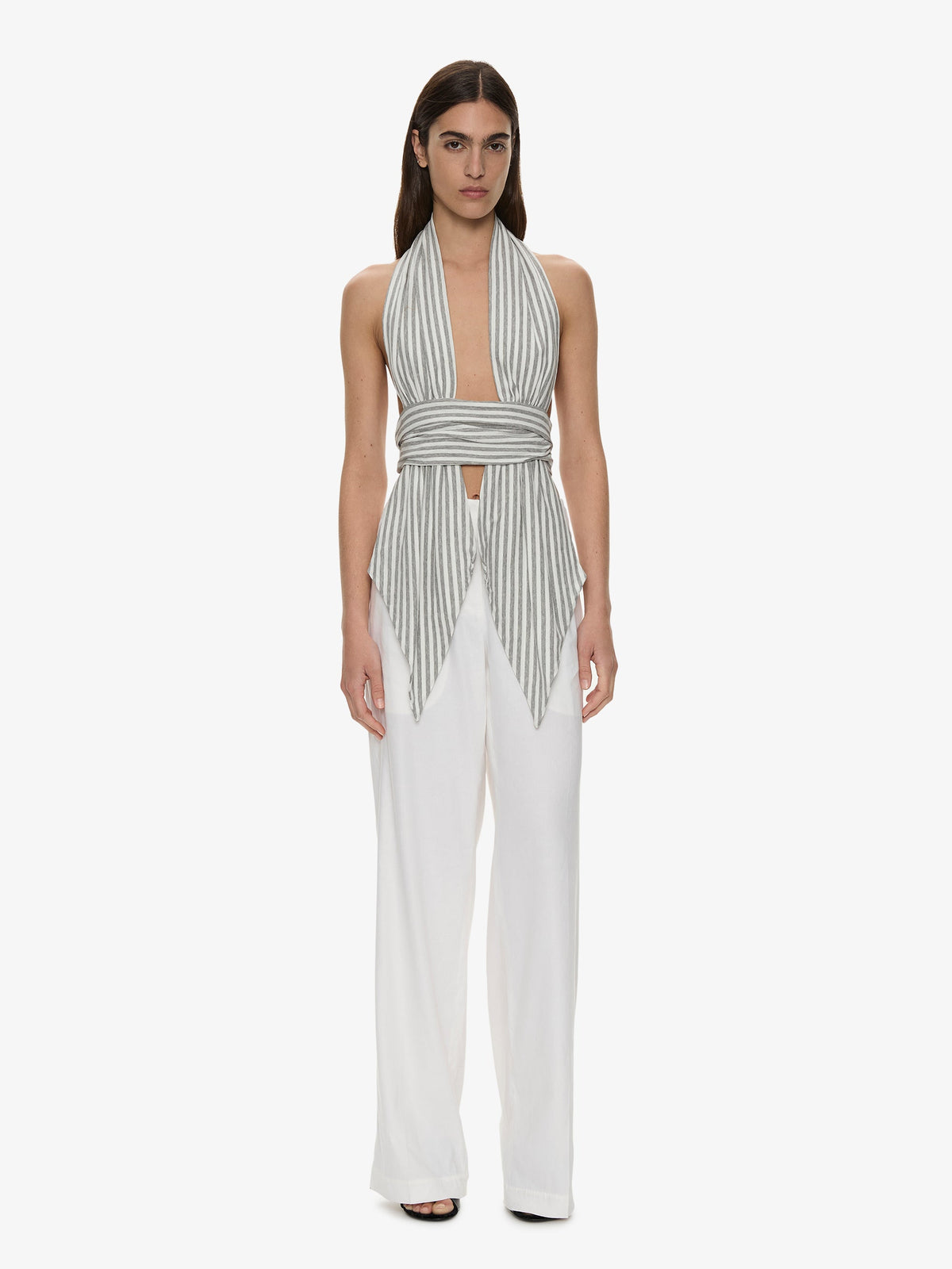 Image of a model wearing Pants. Product name - Redux Linen Trouser in White colour by brand - CHRISTOPHER ESBER