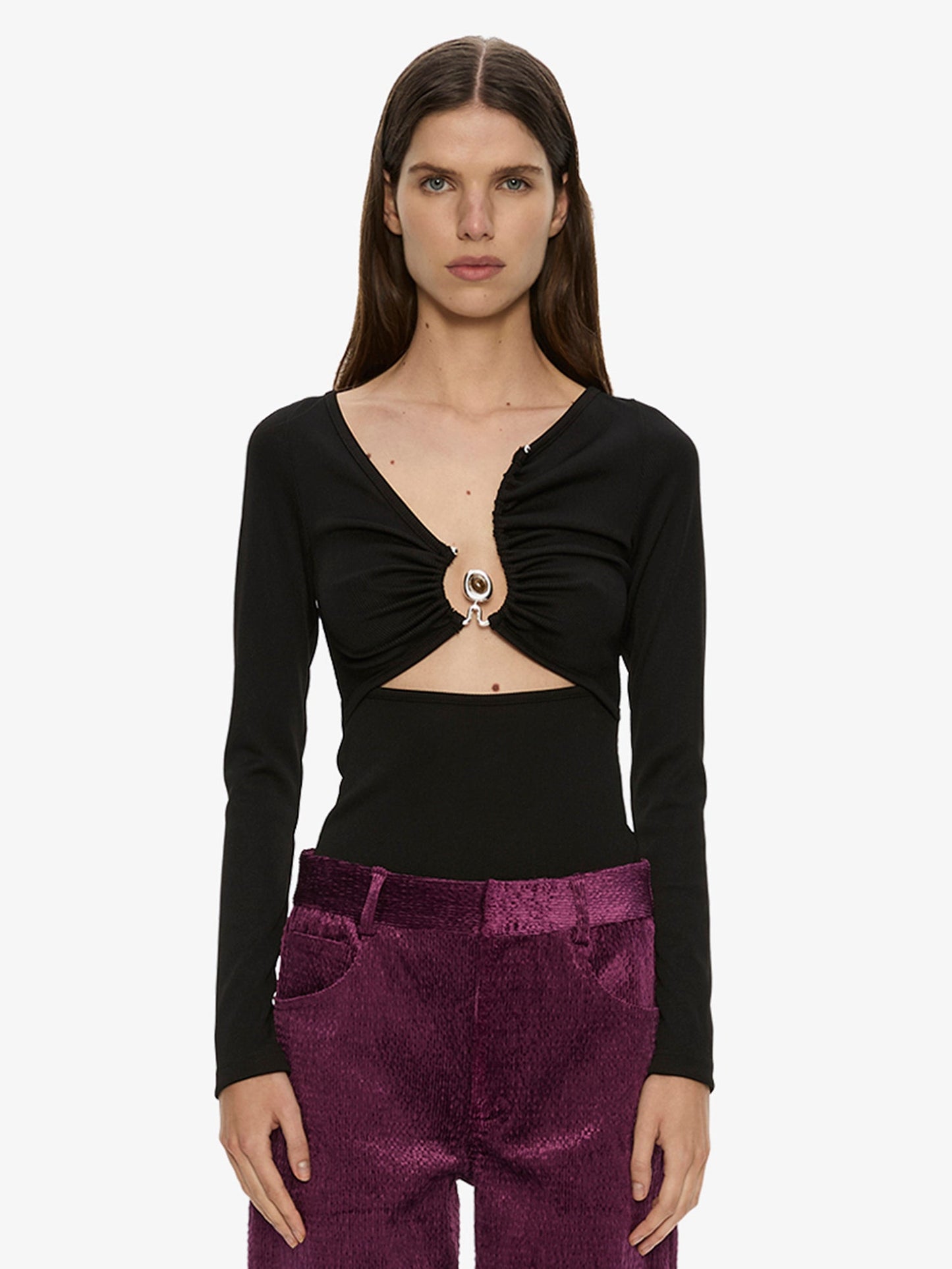 Image of a model wearing Tops. Product name - Diverge Droplet Long Sleeve Top in Black colour by brand - CHRISTOPHER ESBER