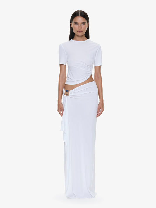 Image of a model wearing Skirts. Productname: CHRISTOPHER ESBER Bezel Quartz Cascade Skirt in White colour by brand - CHRISTOPHER ESBER