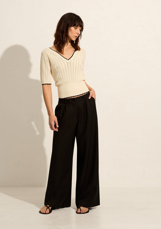 Image of a model wearing Pants. Productname: Auguste The Label Hensley Pant in Black colour by brand - Auguste The Label