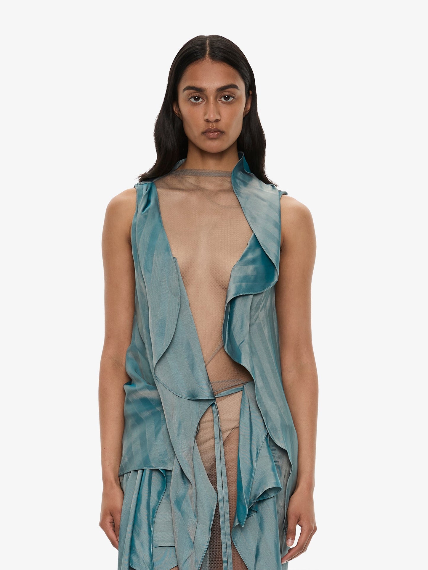 Image of a model wearing Tops. Product name - Kacere Draped Top in Green colour by brand - CHRISTOPHER ESBER