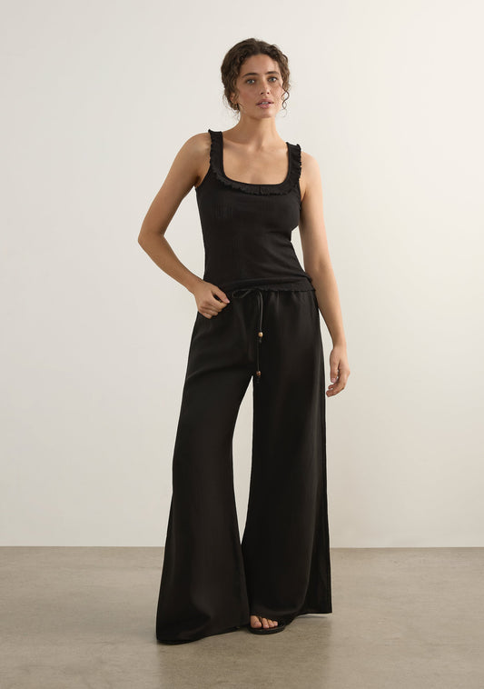 Image of a model wearing Pants. Productname: Auguste The Label Shyla Pant in Print colour by brand - Auguste The Label