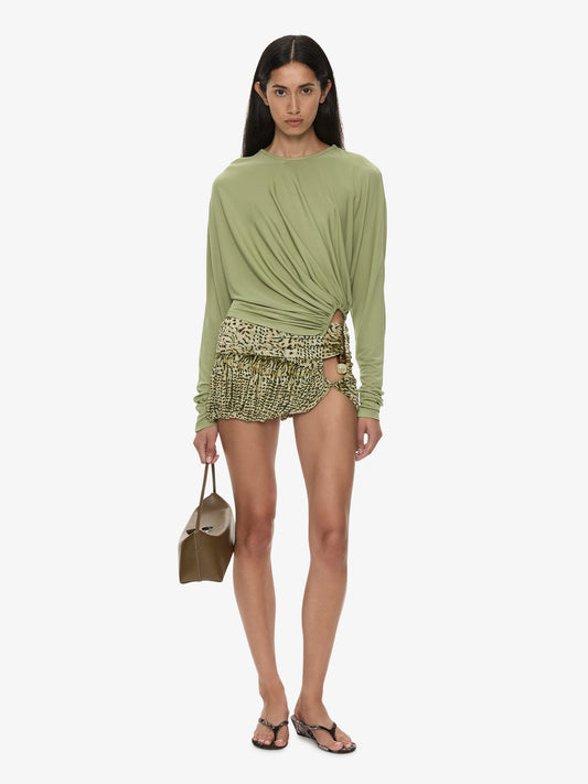 Image of a model wearing Skirts. Product name - Beach Glass Bubble Mini Skirt in Citrine colour by brand - CHRISTOPHER ESBER