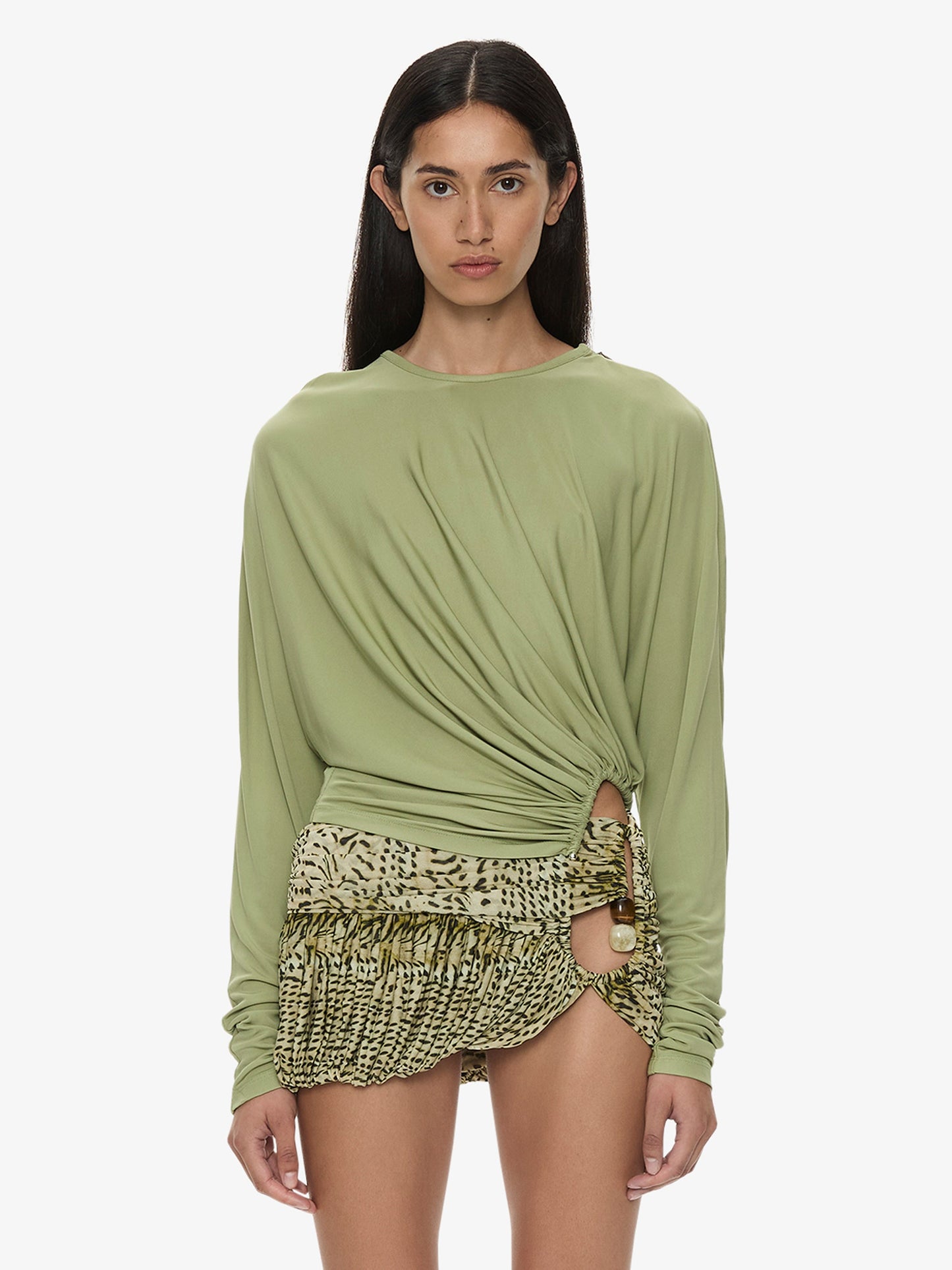 Image of a model wearing Tops. Product name - Manto Long Sleeve Jersey Top in Fennel colour by brand - CHRISTOPHER ESBER