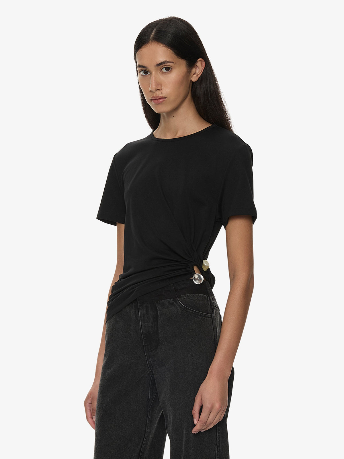 Image of a model wearing Tops. Product name - Bree Quartz Tee in Black colour by brand - CHRISTOPHER ESBER