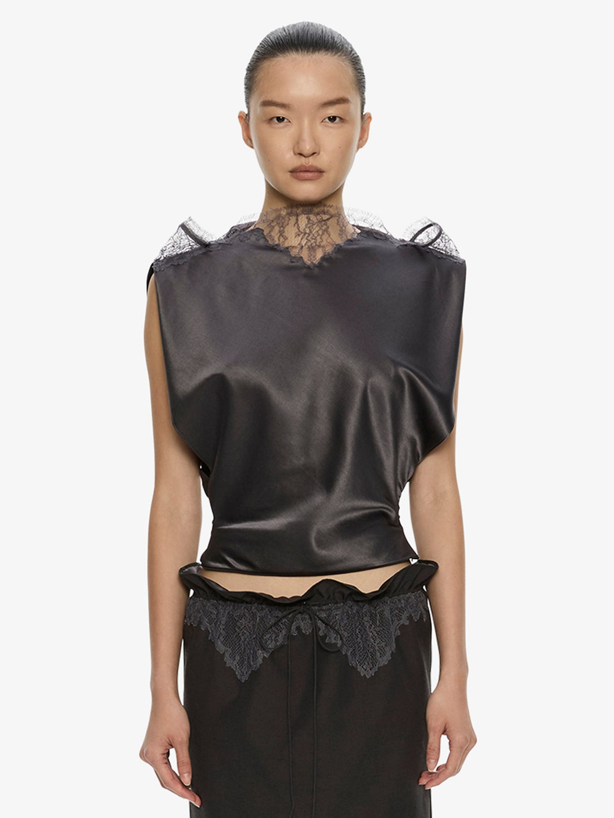 Image of a model wearing Tops. Product name - Anais Sateen Lace Top in Smoke colour by brand - CHRISTOPHER ESBER