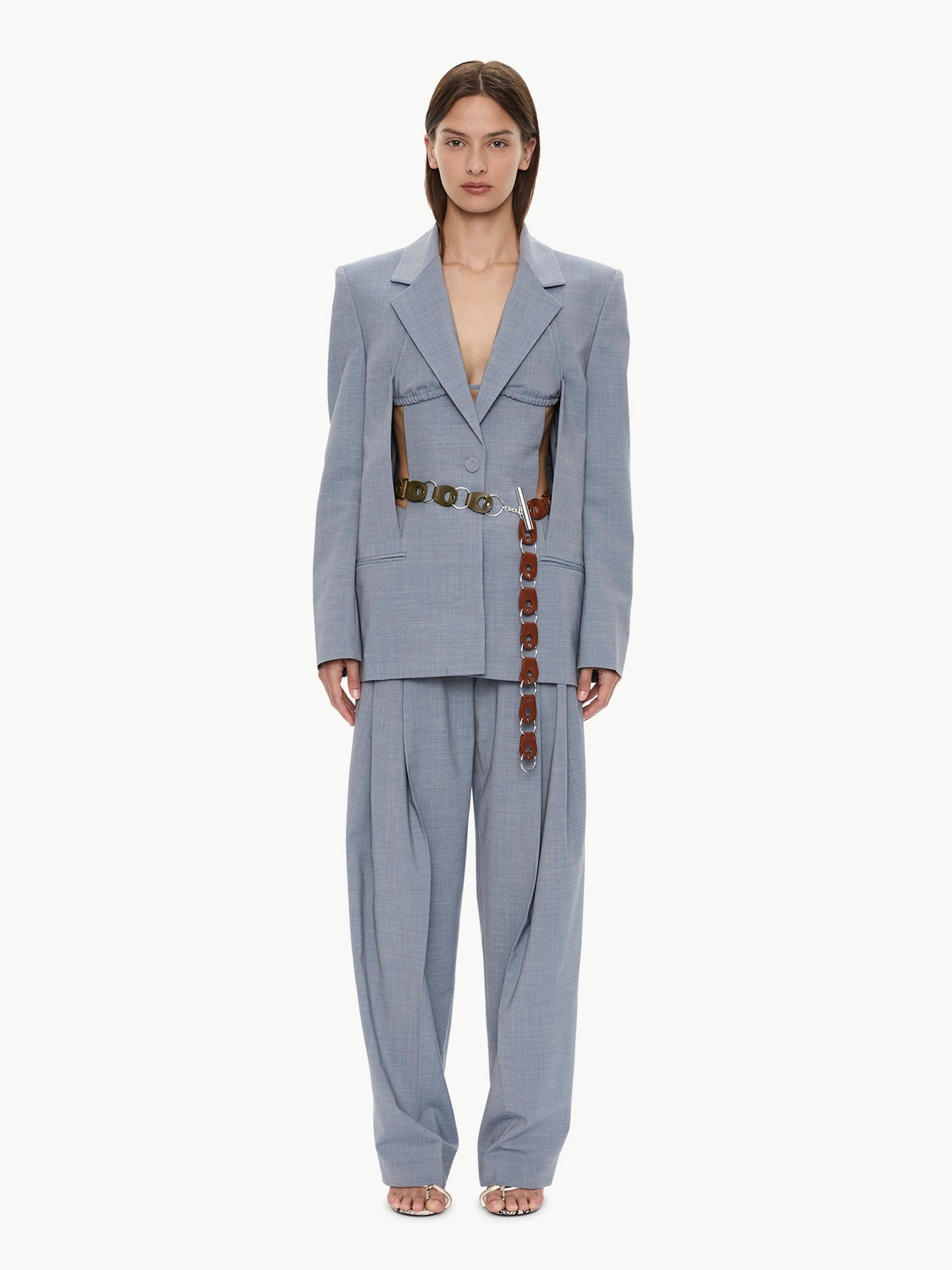 Image of Coats & Jackets. Product name - Slashed Bikini Blazer in Lightwash colour by brand - CHRISTOPHER ESBER