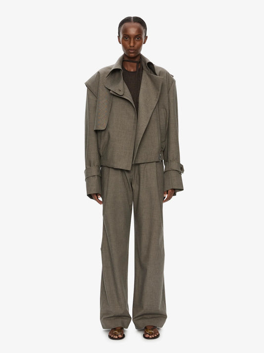 Image of a model wearing Outerwear. Product name - Cropped Trench Bomber Jacket in Pink colour by brand - CHRISTOPHER ESBER