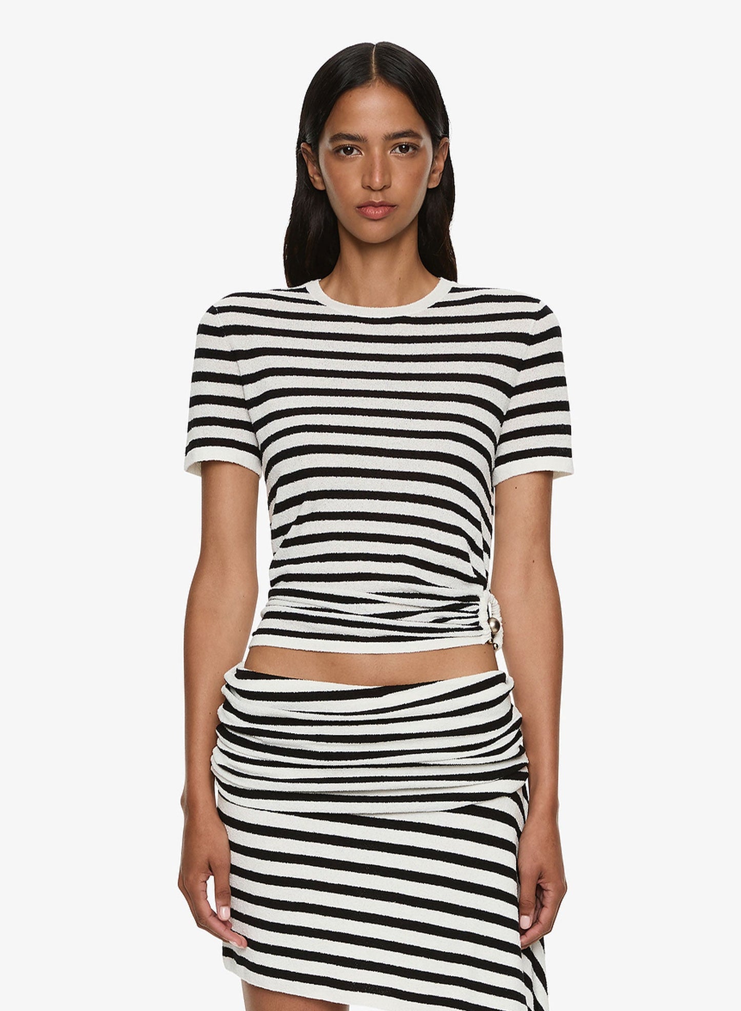 Image of a model wearing Tops. Productname: CHRISTOPHER ESBER Stripe Knit Ruched Orbit Tee in Stripe colour by brand - CHRISTOPHER ESBER