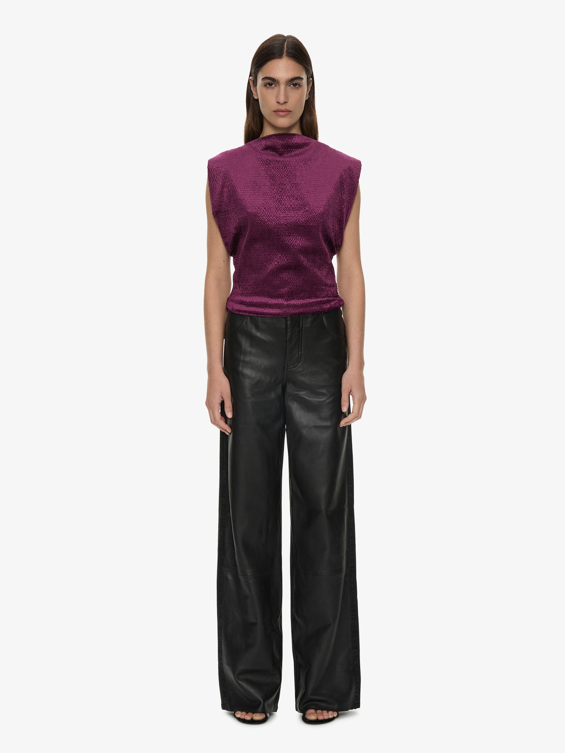 Image of a model wearing Tops. Product name - Banyan Top in Plum colour by brand - CHRISTOPHER ESBER