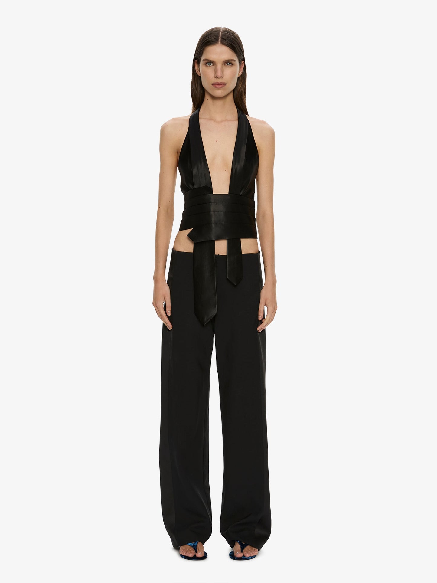 Image of a model wearing Pants. Product name - Tuxedo Contrast Wool Trouser in Black colour by brand - CHRISTOPHER ESBER