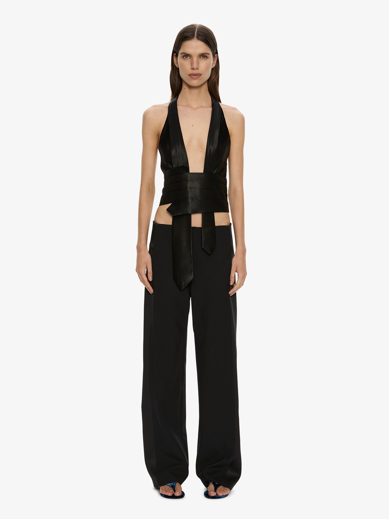 Image of a model wearing Pants. Product name - Tuxedo Contrast Wool Trouser in Black colour by brand - CHRISTOPHER ESBER